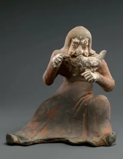 Fauconnier assis, Milieu à la fin du VIe siècle. Dynastie des Wei du Nord (386-534) - Dynastie des Qi du Nord (550-577)